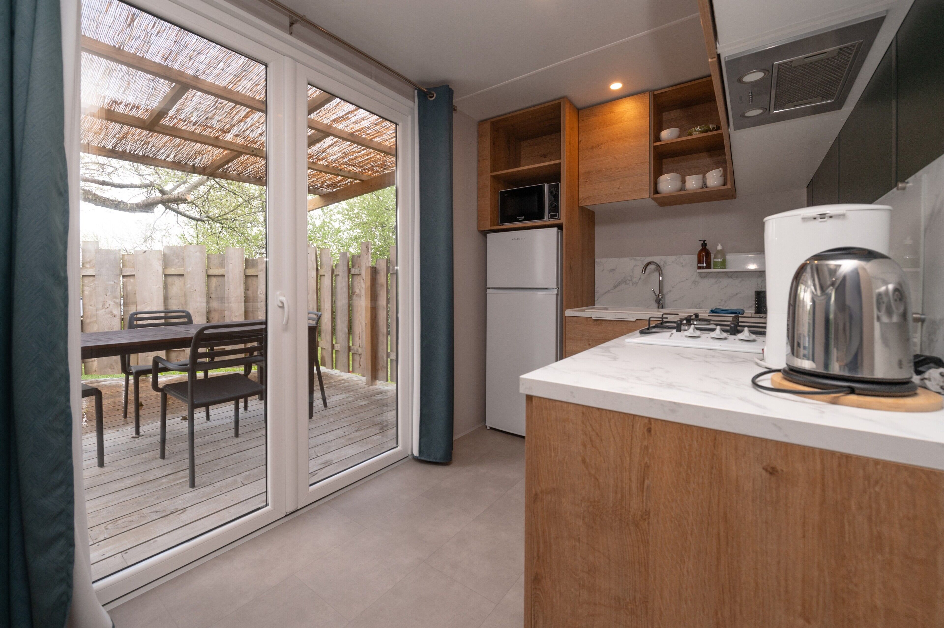 Fridge, microwave, stovetop, coffee/tea maker