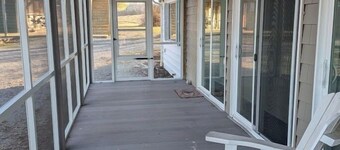 Relax at this peaceful two home countryside retreat with a private hot tub, pond views, 2 fire pits, and fishing for cozy comfort and country charm for everyone.