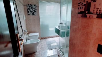 Shower, free toiletries, hair dryer, towels