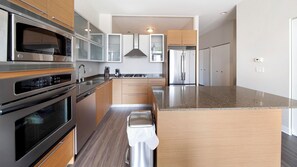 Fridge, dining tables - Landing | Incredible 2BD, Rooftop Lounge, Gym (Chicago)