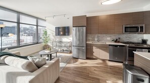 Fridge, dining tables - Landing | Incredible 1BD, Game Room (Chicago)