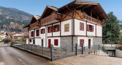 Jack Apartment in Central Pinzolo with Mountain View, Private Garden & Balcony