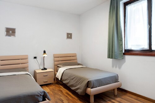 Jack Apartment in Central Pinzolo with Mountain View, Private Garden & Balcony