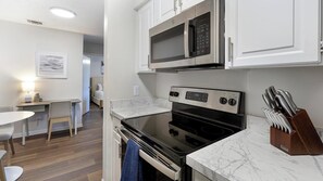 Fridge, dining tables - Landing | Stylish 1BD, Courtyard, Gym (Denton)