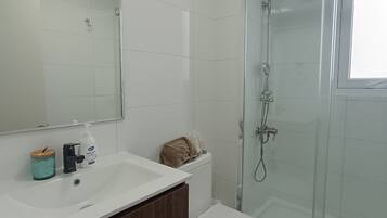 Hair dryer, towels, toilet paper