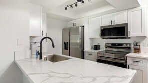 Fridge, dining tables - Landing | Incredible 1BD, Courtyard (Paradise)