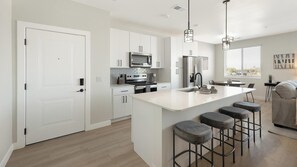 Fridge, dining tables - Landing | Stunning 1BD, Pool, Gym (Casa Grande)