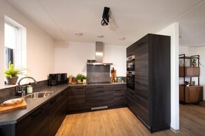 Fridge, microwave, dishwasher, coffee/tea maker