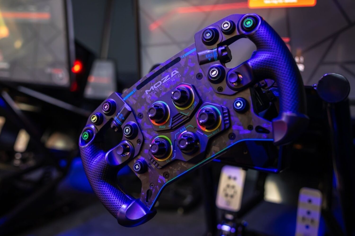 A gaming controller with multiple buttons and a textured grip.