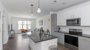 Fridge, dining tables - Landing | Amazing 1BD, Yoga Studio, Gym (Jacksonville)