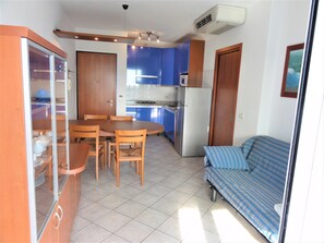 Apartment, 2 Bedrooms, Terrace | Living room - Relax in Comfort With Pool and sea Nearby (San Michele al Tagliamento)