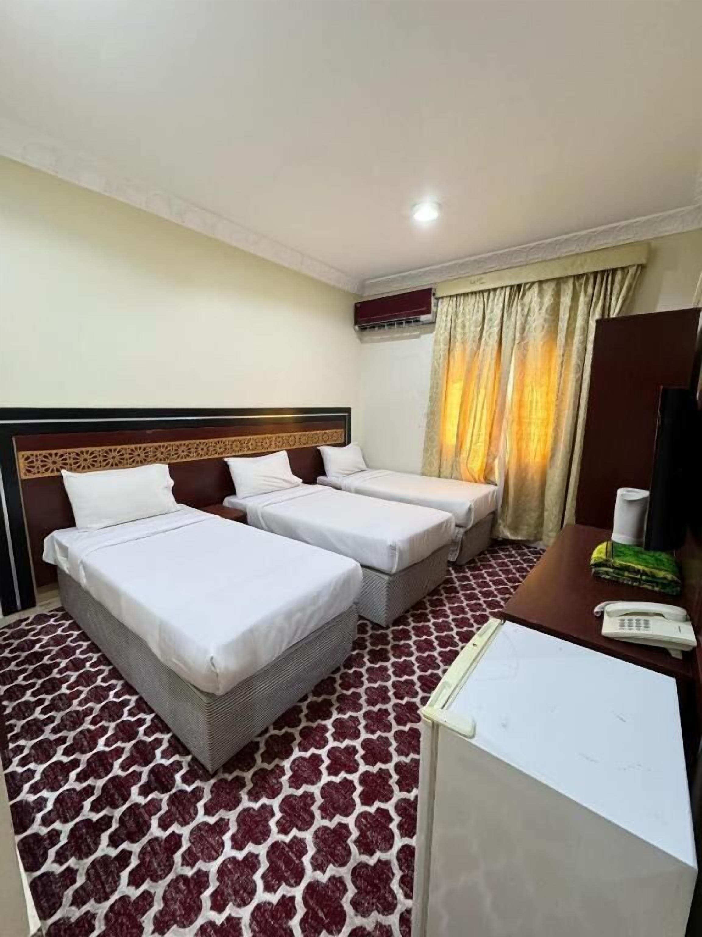 Kamar Triple | Wi-Fi gratis dan seprai linen