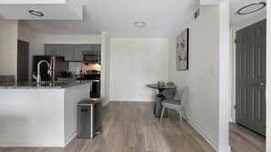 Fridge, dining tables - Landing | Stylish 1BD, Pool, Gym (Nashville)