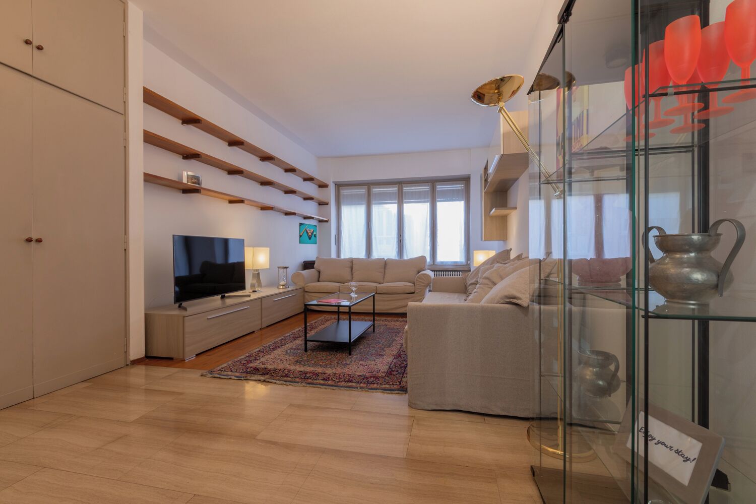 Basic Apartment, Balcony | Living area | 35-cm TV with satellite channels