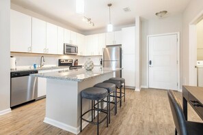 Fridge, dining tables - Landing | Chic 2BD, Pool, Clubhouse (Wesley Chapel)
