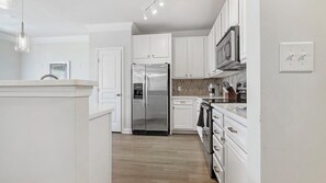 Fridge, dining tables - Landing | Spectacular 2BD, Courtyard, Pool (Cary)