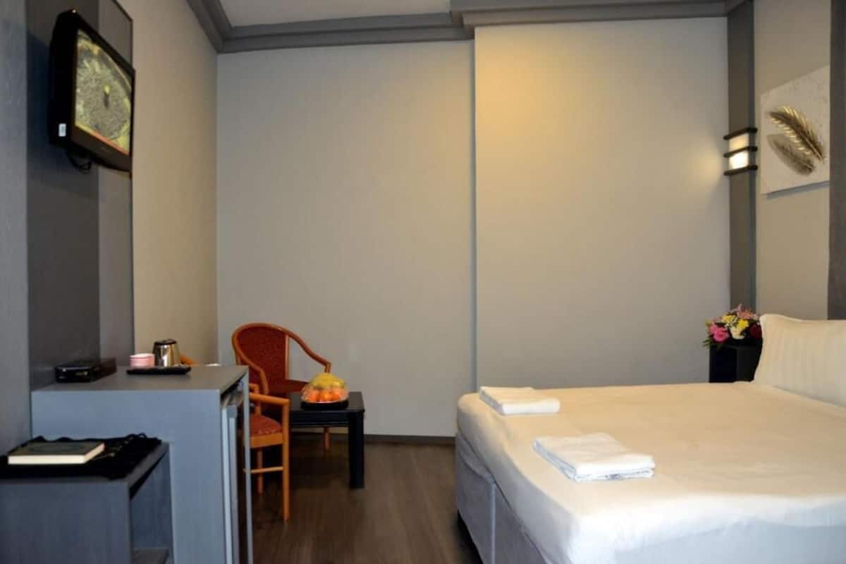 Værelse med 2 enkeltsenge | Gratis Wi-Fi, sengetøj