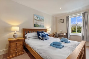 Iron/ironing board, travel crib, free WiFi, bed sheets