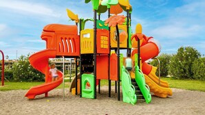 A playground with slides and climbing structures. - Cozy home in Tarquinia with swimming pool (Tarquinia)