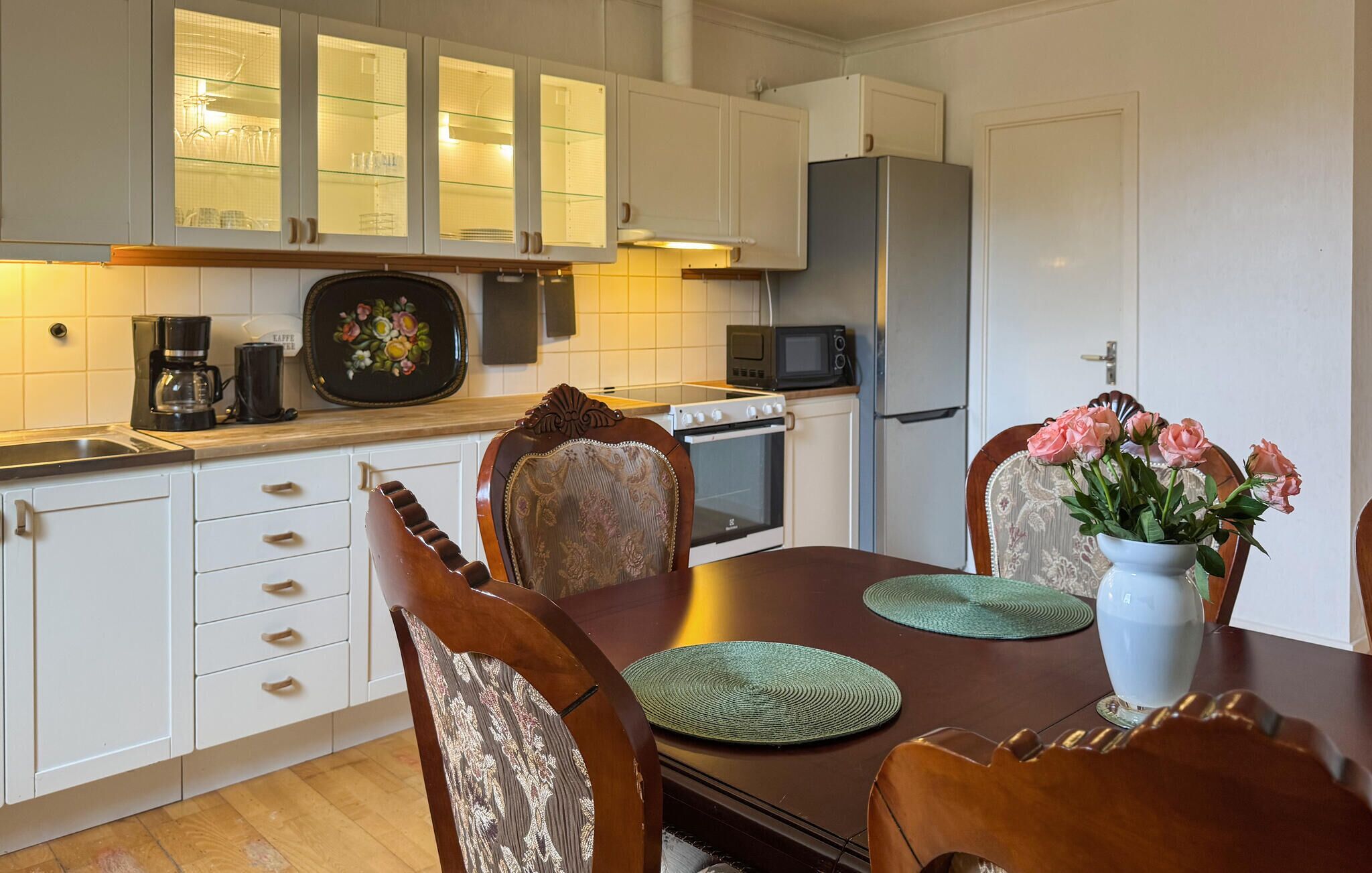 Fridge, stovetop, dishwasher, coffee/tea maker