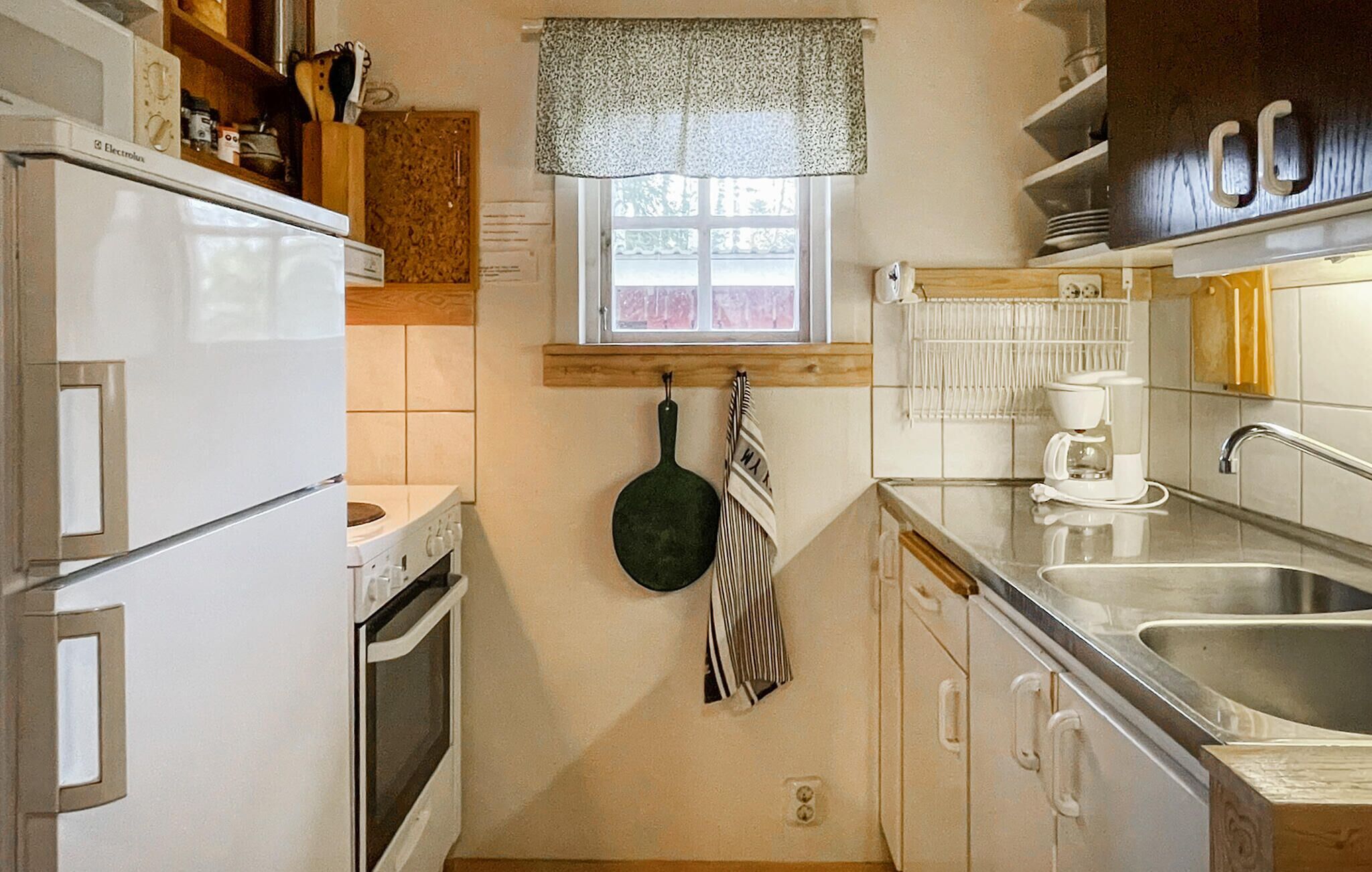 Fridge, stovetop, coffee/tea maker, cookware/dishes/utensils