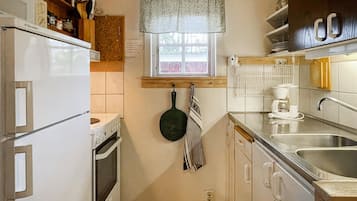 Fridge, stovetop, coffee/tea maker, cookware/dishes/utensils