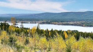A lake surrounded by forested hills. - 3 bedroom beautiful home in Torsby (Torsby)