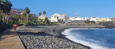 En la playa y toallas de playa