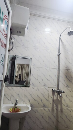 Superior Apartment | Bathroom | Shower, towels, soap, toilet paper