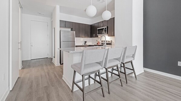 Fridge, dining tables - Landing | Stylish 2BD, Gym, Rooftop Lounge (Birmingham)