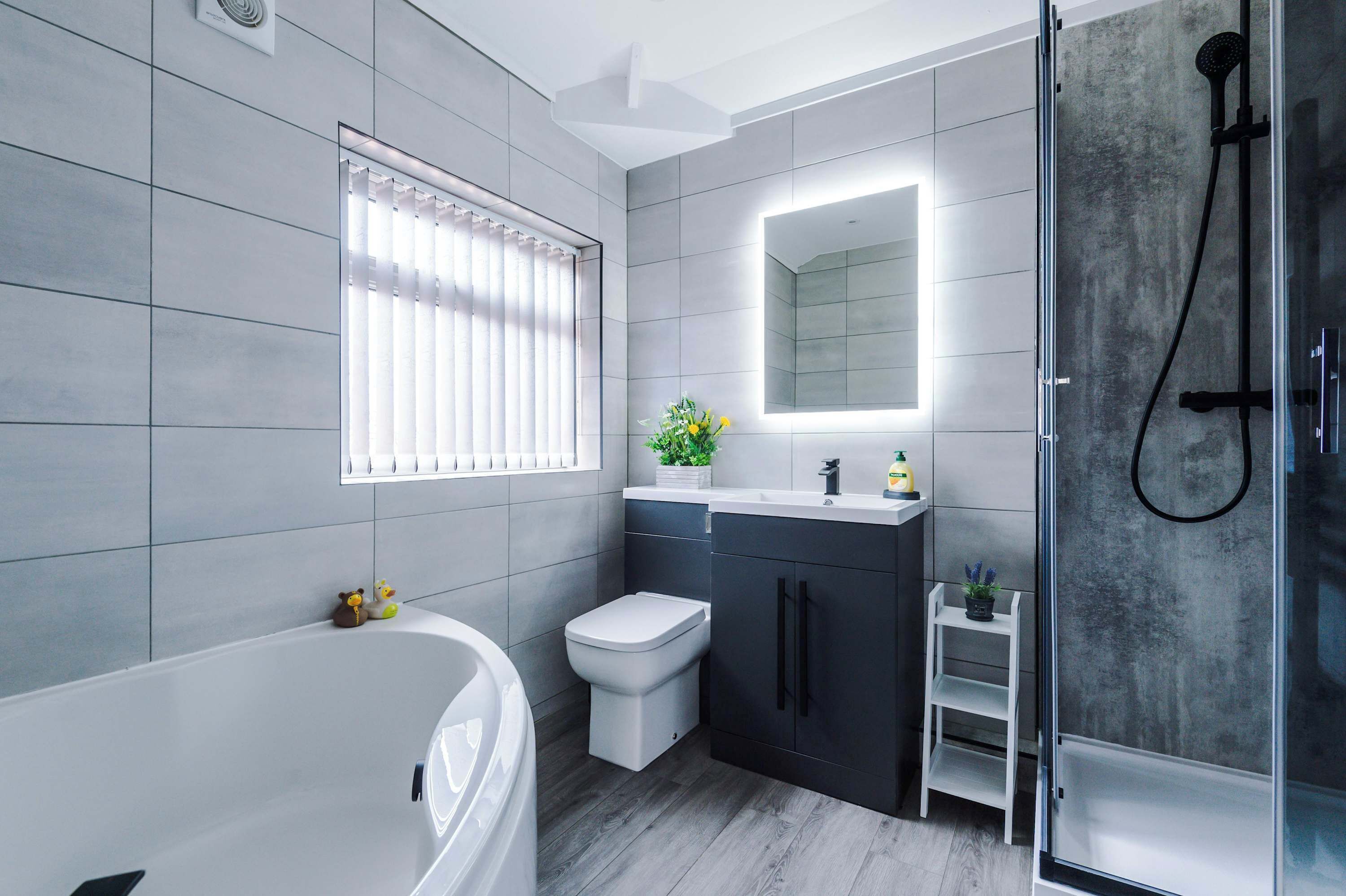 Shower, hair dryer, towels, shampoo