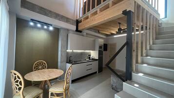 Deluxe Duplex, Balcony, Pool View with private pool | Living area | 32-inch Smart TV with digital channels