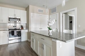 Fridge, dining tables - Landing | Stylish 1BD, Pool, Clubhouse (Orlando)