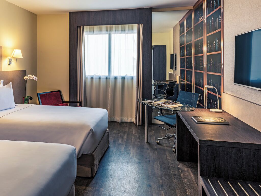 Deluxe Twin Room, City View | Minibar, laptop workspace, blackout drapes, free WiFi