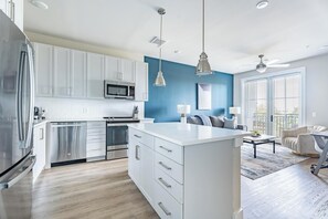 Fridge, dining tables - Landing | Stunning 1BD, Game Room, Yoga Studio (Savannah)