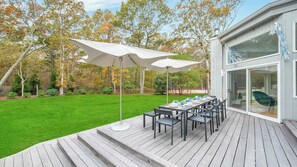 Outdoor dining - Sunlit Retreat with Pool, Tennis Court, and Seamless Indoor-Outdoor Living... (East Hampton)
