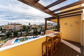Outdoor dining - 209 Los Prados' Bright, modern and spacious apartment with pool, walking distance of the center (La Cala de Mijas)