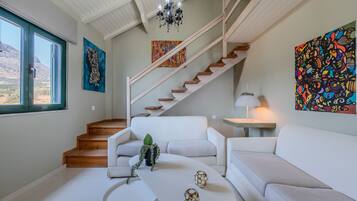 Apartment, 1 Bedroom, Smoking, Pool Access | Living room | Fireplace