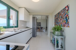 Apartment, 1 Bedroom, Smoking, Pool Access | Private kitchen | Coffee/tea maker, high chair, cookware/dishes/utensils - Gallery Apartment (Viannos)