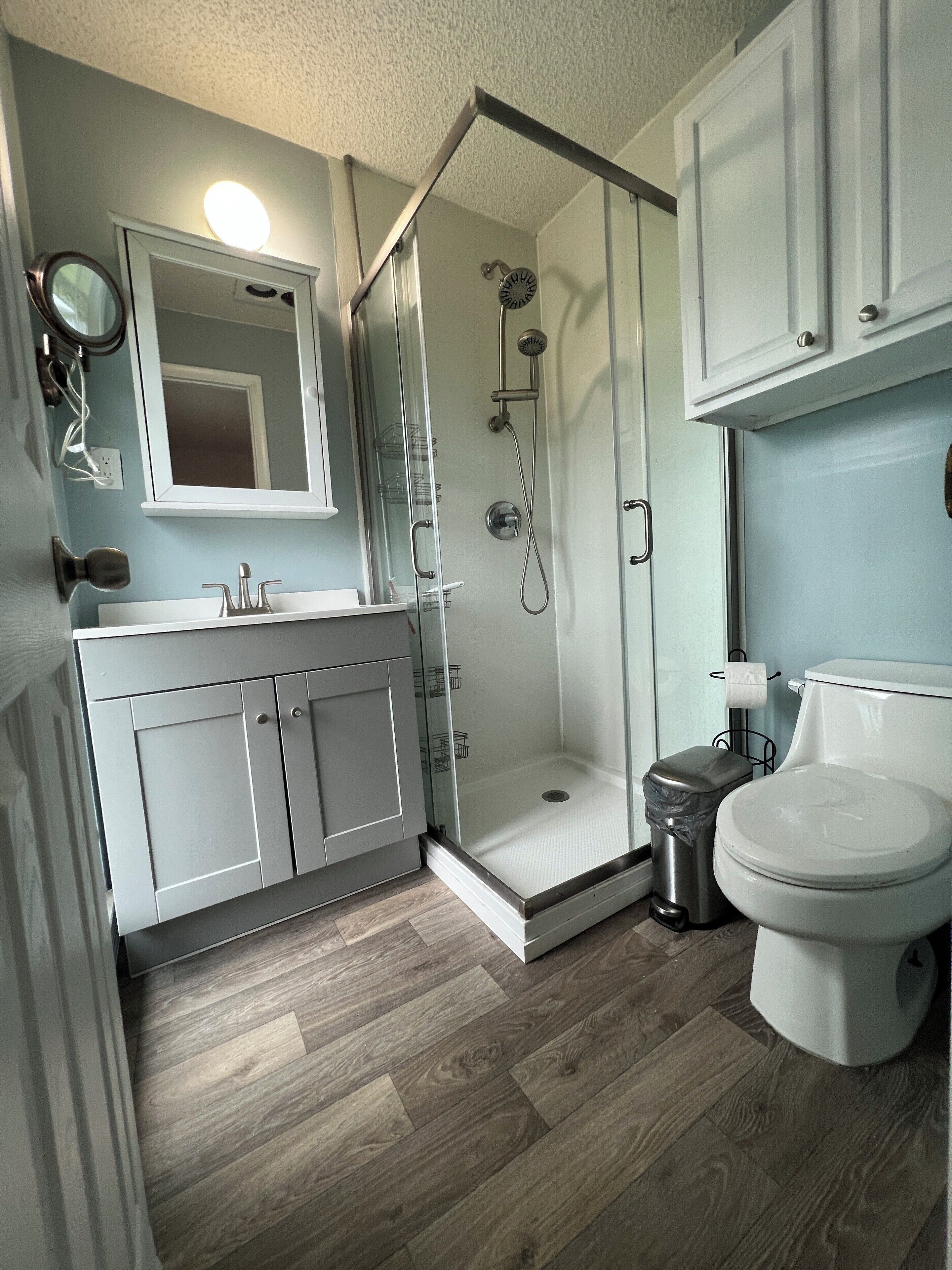 Shower, towels, soap, toilet paper
