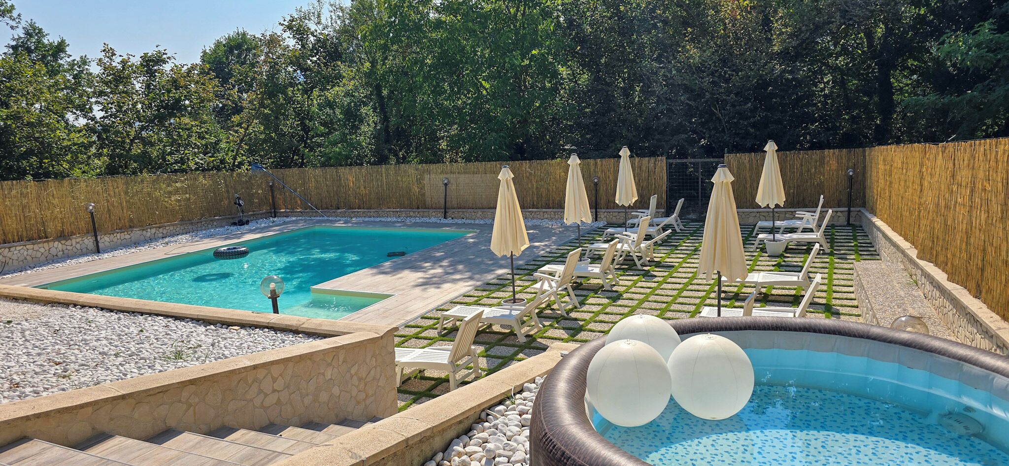 Seasonal outdoor pool, pool loungers