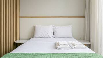Ferros/tábuas de passar roupa, acesso à internet, roupa de cama