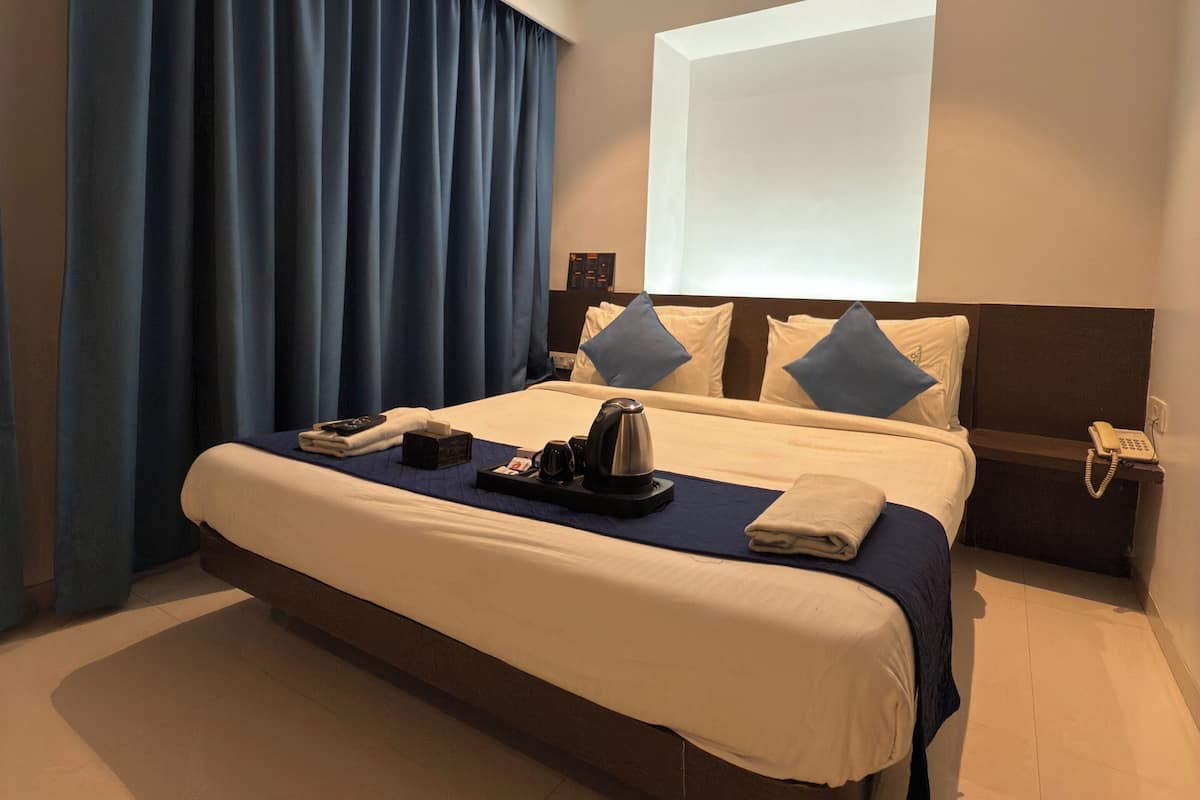 Standard Double Room, City View | Desk, laptop workspace, iron/ironing board, free WiFi