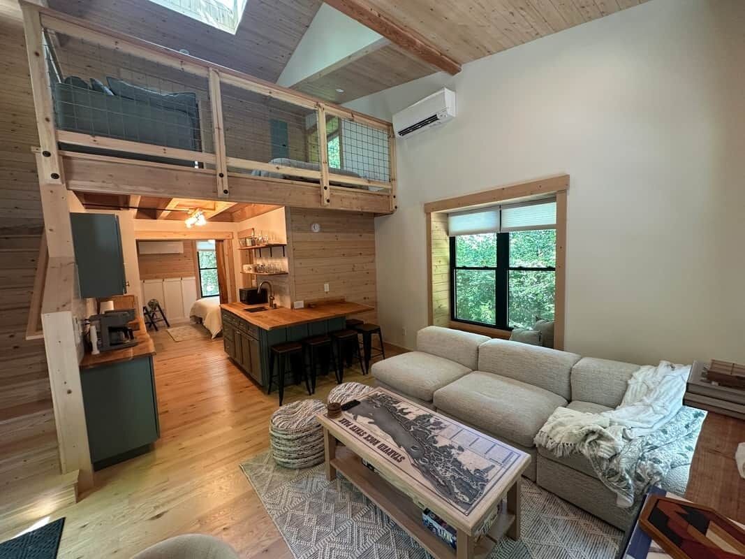 Smart TV, fireplace, books, stereo