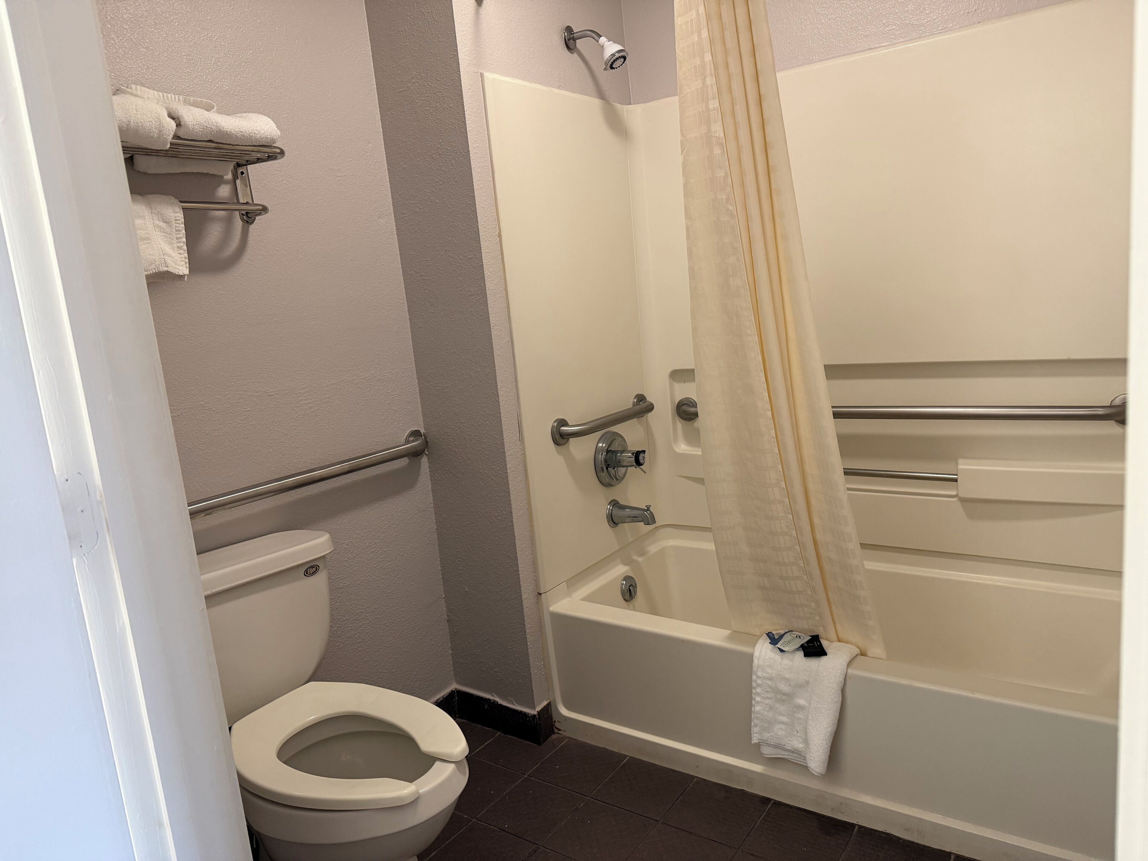 Room, 2 Double Beds, Mobility Accessible, Non Smoking | Bathroom | Hair dryer, towels, soap, shampoo