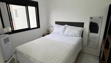 Apartamento, 1 cama de casal e sofá-cama, vista para a cidade | Ferros/tábuas de passar roupa, Wi-Fi de cortesia