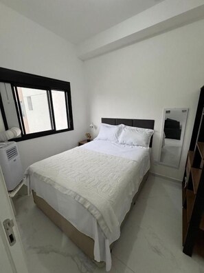 Apartamento, 1 cama de casal e sofá-cama, vista para a cidade | Ferros/tábuas de passar roupa, Wi-Fi de cortesia
