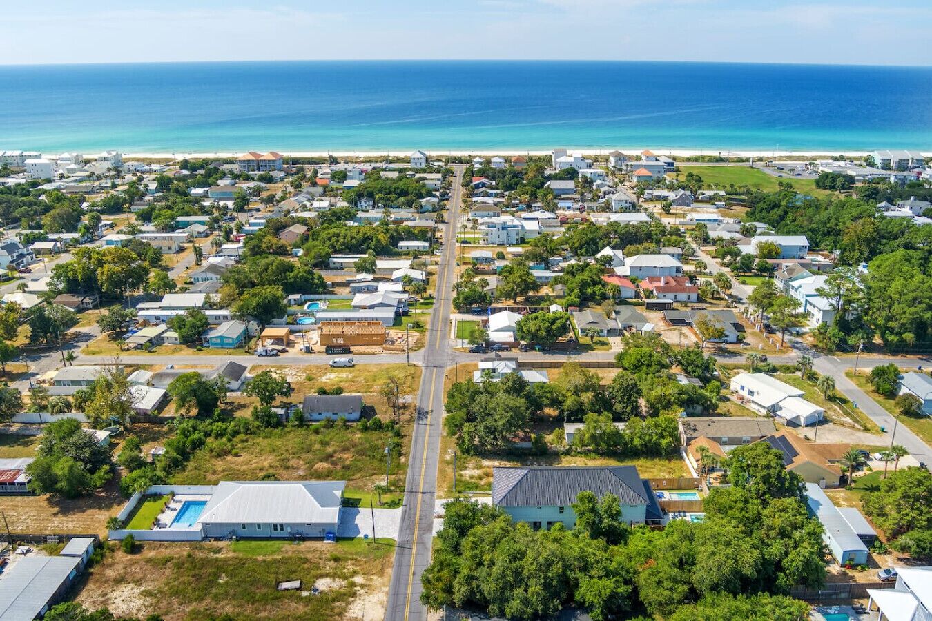 Minutes to the sand! Shot highlighting the easy walk/bike ride to the ocean in this quiet, sought-after beach community.