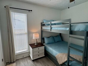 Fun & Functional: Perfect for kids or extra guests! This room features a sturdy, modern bunk bed setup and cozy blue bedding for a comfortable night`s rest. - Beach Ya To It! Private Pool, Hot Tub, + Game Room! (Panama City Beach)