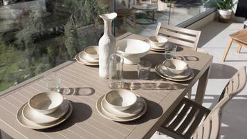 Luxury Apartment, Partial Sea View | Outdoor dining